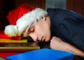 Tired Young Man sleep on the Books Royalty Free Stock Photo