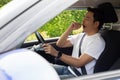 Tired young man sleep in car,