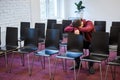 Tired young man snoozed in conference room Royalty Free Stock Photo