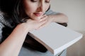 Tired young woman or Entrepreneur sleeping on sofa after long hours work on laptop, Overworked exhausted. businesswoman Royalty Free Stock Photo