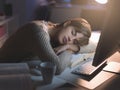 Tired woman sleeping on the desk Royalty Free Stock Photo