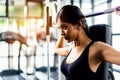 tiredness from exercise by lifting weights and sit back and wipe the sweat off your face. Muscular and strong body Royalty Free Stock Photo