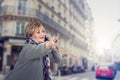 Tireless older businesswoman catching a taxi