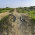 Tires buried and abandoned in the field Royalty Free Stock Photo