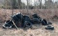 Tires Illegally Dumped in a Field.