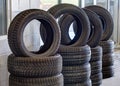 Sets of tires for sale at an auto repair shop.
