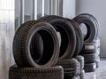 Sets of tires for sale at an auto repair shop.