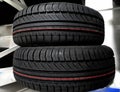 Tires ster. Tread blocks and sipes on new tires stock photo