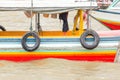 Tires tied to the side of the boat