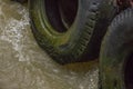 Tires tied to the side of the boat