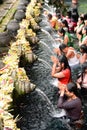 Devotees at ritual purification. Tirta Empul. Tampaksiring. Gianyar regency. Bali. Indonesia