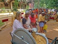 Giving out free food to sadhu`s and beggars in the Sri Ramana Maharshi Ashram in