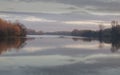 Tisa river,fisher boat in autumn november afternoon