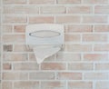 Tissue box and brick and wall texture for pattern abstract background.Paper towel in bathroom. Royalty Free Stock Photo