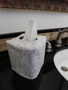 Tissue box with fabric cover on bathroom counter Royalty Free Stock Photo