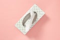 Tissue box on pastel pink background Royalty Free Stock Photo