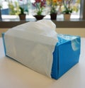 Tissue box on white table Royalty Free Stock Photo