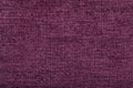 tissue structure closeup. fiber texture polyester close-up. fine grain felt violet fabric background