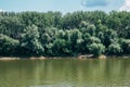 Tisza River and green trees in Szeged, Hungary Royalty Free Stock Photo