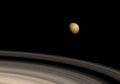 Titan and Saturn rings Royalty Free Stock Photo