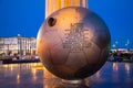 Titanium monument to first astronaut Yuri Gagarin on Gagarin Square at evening dusk.