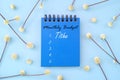 Tithe and offering as part of budget priority concept. Notepad with written monthly budget. Royalty Free Stock Photo