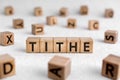 Tithe - words from wooden blocks with letters Royalty Free Stock Photo