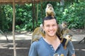 Titi monkeys with animal trainer