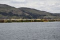 Titicaca lake, Puno, Peru. Uros floating islands on Titicaca lake in Puno, Peru, South America Royalty Free Stock Photo