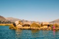 Unidentifiable local women working in lake Titicaca Uros community, Peru