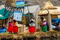 Titikaka lake, tourists visiting Uros islands in Peru