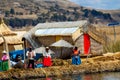 Titikaka lake, tourists visiting Uros islands in Peru