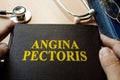 Title Angina pectoris on a book. Royalty Free Stock Photo