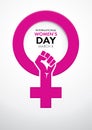 Title International Women`s Day inside the symbol of woman in pink with a closed fist inside the symbol on white background.