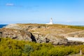 The lighthouse `Poulains` of the famous island Belle Ile en MerTitre Royalty Free Stock Photo