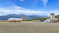 Tivat airport with aiplanes and mountains Royalty Free Stock Photo