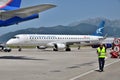 Tivat, Montenegro - June 8. 2019. Montenegro airline plane on the take-off field to international airport. Embraer 195 Royalty Free Stock Photo