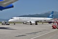 Tivat, Montenegro - June 8. 2019. Montenegro airline plane on the take-off field to international airport. Embraer 195 Royalty Free Stock Photo