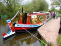 Painted narrowboat on English canal