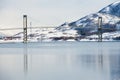 The Tjeldsund suspension road Bridge in winter crossing the Tjeldsundet strait, Troms county, Norway.