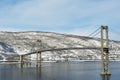 The Tjeldsund suspension road Bridge in winter crossing the Tjeldsundet strait, Troms county, Norway.