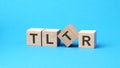 tltr - text on wooden blocks, business concept, blue background Royalty Free Stock Photo