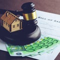 To buy real estate legally. Little wooden house, euro banknotes Royalty Free Stock Photo