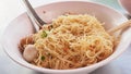 To clenching the egg noodle at food shop and photo extra close u Royalty Free Stock Photo