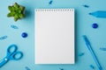 To-do list concept. Above overhead flat lay close up view photo of clear spiral notepad with chaotic stationery isolated light