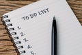 To Do List concept, pen on white paper note pad with handwritten Royalty Free Stock Photo