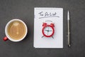 The to do list with cup of coffee and a clock as a time management concept Royalty Free Stock Photo