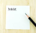 To do list word on notepad and pencil on wood table