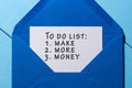 To do list with words Make More Money pinned at blue envelope. Business concept Royalty Free Stock Photo