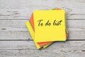 To do list on yellow adhesive note flat lay Royalty Free Stock Photo